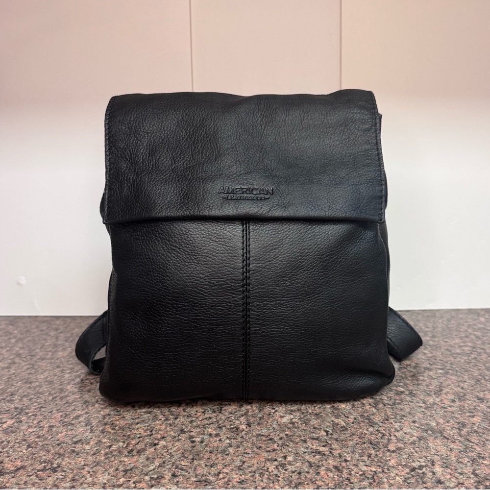 American Leather Co. black leather backpack.